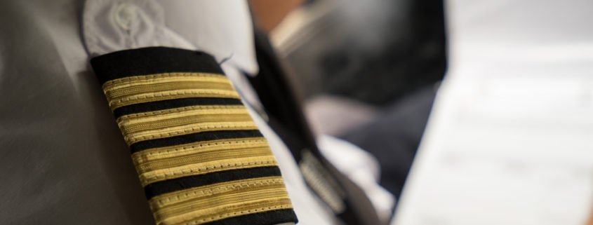 What do the number of stripes on a pilots uniform mean?