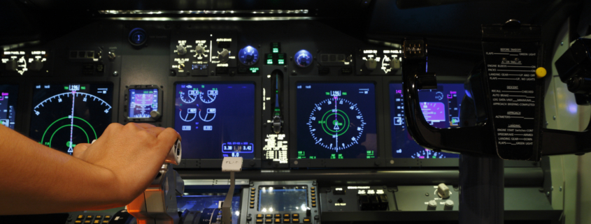 Boeing 737NG cockpit illuminated at night for pilot training and simulator revision