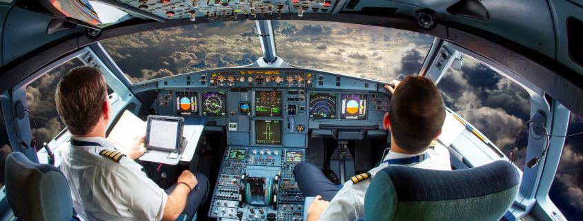 Airbus A320 flight deck with pilots during flight operations